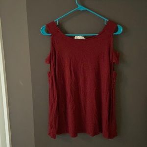 Long sleeve cold shoulder top.